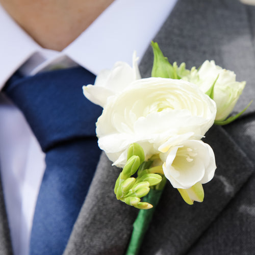 San Francisco wedding florist Flower Lab Design. Classic wedding boutonniere in white for the groom