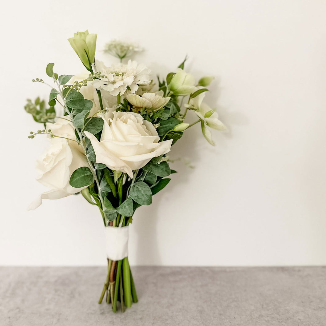Delicate bridesmaid bouquet in all white color palette featuring roses featured in San Francisco wedding - Bridesmaid Bouquet