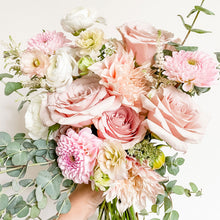 Load image into Gallery viewer, Elegant pastel pink bridal bouquet featuring dahlias, roses, and seasonal blooms from the San Francisco Flower Market, arranged in a refined garden-style with lush greenery - Bridal Bouquet
