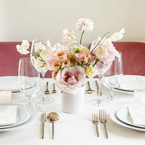 San Francisco wedding reception table centerpiece designed with sweet pea, ranunculus, rose, and lisianthus - Reception Centerpiece